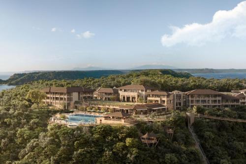 an aerial view of a resort with a pool at Nekajui, a Ritz-Carlton Reserve in Papagayo, Guanacaste