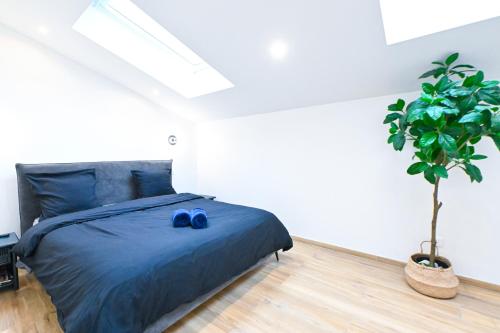 Postel nebo postele na pokoji v ubytování Beau deux pièces cozy avec terrasse n11