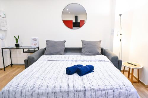 Ένα ή περισσότερα κρεβάτια σε δωμάτιο στο Beau studio cozy centre ville et plages avec terrasse n3