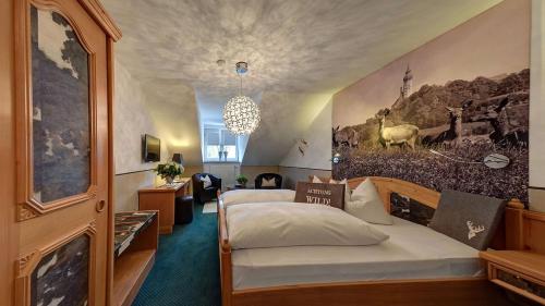 Postel nebo postele na pokoji v ubytování Boutique Hotel POST ANDECHS
