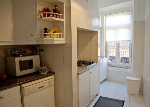 Küche/Küchenzeile in der Unterkunft Chiado Lisbon Apartment