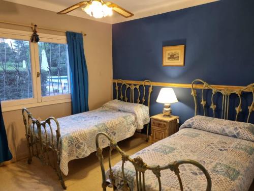 Postel nebo postele na pokoji v ubytování El Descanso New