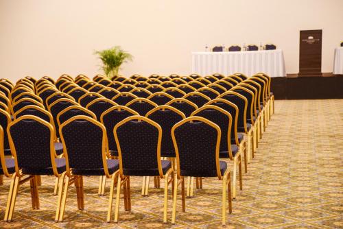 a row of chairs lined up in a room at Crown Paradise Club Cancun - All Inclusive in Cancún