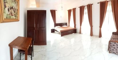 Giường trong phòng chung tại French Villa - Colombo