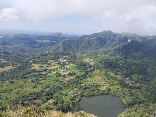 an aerial view of a mountain with two lakes at Cabaña Marys - privacidad y tranquilidad en las montañas de panamá in San Carlos