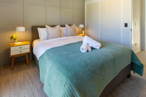 Ένα ή περισσότερα κρεβάτια σε δωμάτιο στο 2 bed 2 bath with Carpark near Canterbury University