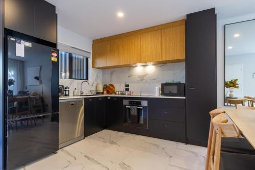 Η κουζίνα ή μικρή κουζίνα στο 2 bed 2 bath with Carpark near Canterbury University