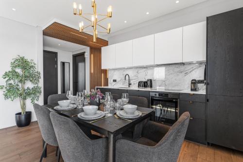 Kuchyň nebo kuchyňský kout v ubytování ALVA Apartments