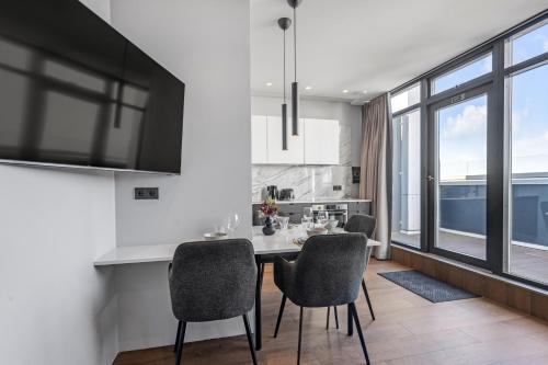 Kuchyň nebo kuchyňský kout v ubytování ALVA Apartments