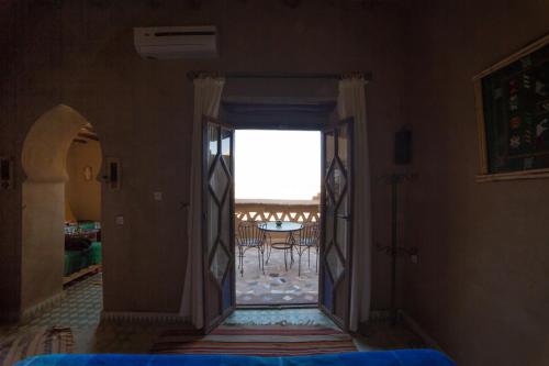 Postel nebo postele na pokoji v ubytování Kasbah Hotel Panorama