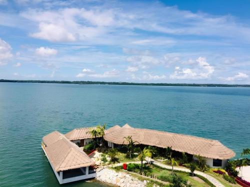 an island in the middle of a large body of water at Doulos Phos The Ship Hotel in Lagoi