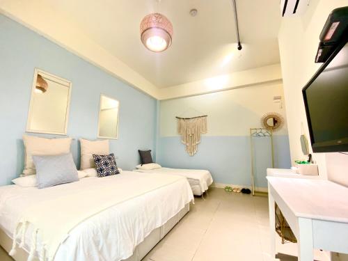 Televisyen dan/atau pusat hiburan di Pinky Promise Villa