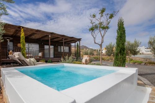 Bazén v ubytování Finca Jardín del Norte nebo v jeho okolí
