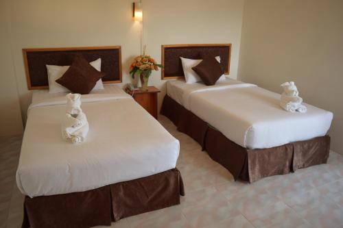 Postel nebo postele na pokoji v ubytování Hotel De Ratt