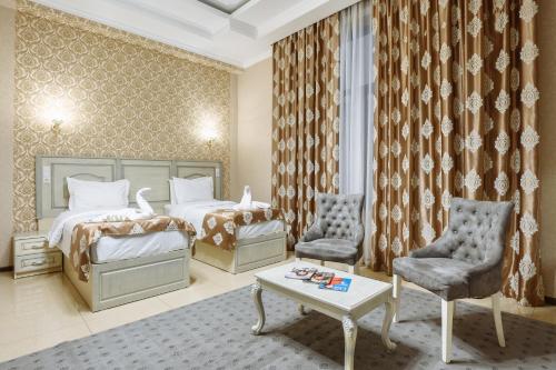 Katil atau katil-katil dalam bilik di Sofiya Tashkent Hotel