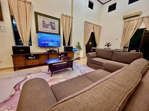 Televisyen dan/atau pusat hiburan di Afamosa private pool Villa1007 karaoke snuker