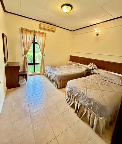 Katil atau katil-katil dalam bilik di Afamosa private pool Villa1007 karaoke snuker