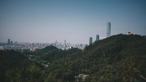 a view of a city from the top of a hill at Dongguan Marriott Hotel in Dongguan