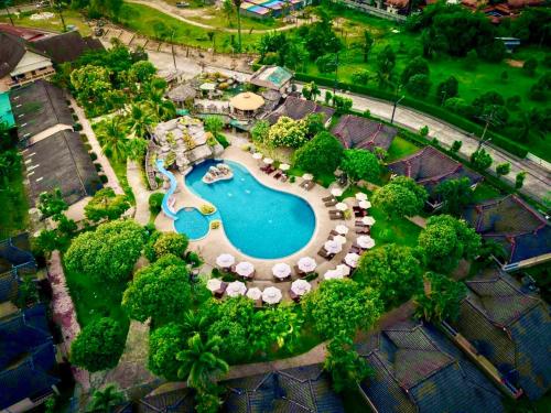 an aerial view of a swimming pool in a resort at Happy Lagoon Bungalow in Khao Lak