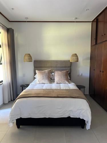 Cama o camas de una habitación en Somer House Guest Suites