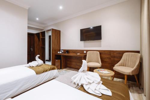 Katil atau katil-katil dalam bilik di Sofiya Tashkent Hotel