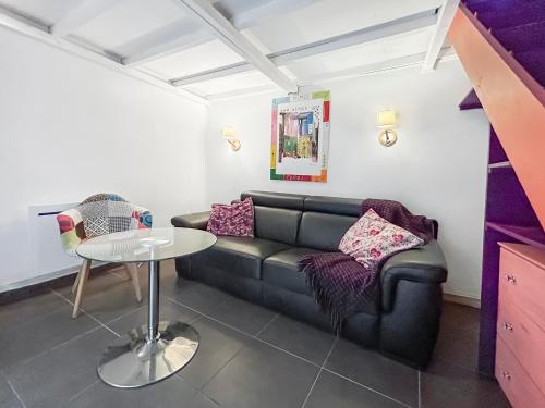 Posezení v ubytování Chez Jeanine - Studio avec Wifi et Climatisation