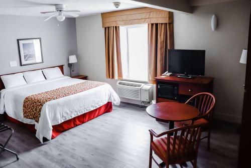 Postel nebo postele na pokoji v ubytování Super 8 by Wyndham Campbellton NB