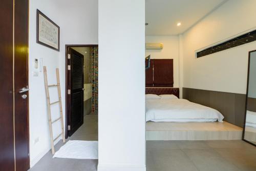 Ένα ή περισσότερα κρεβάτια σε δωμάτιο στο DayDream Pool Villa
