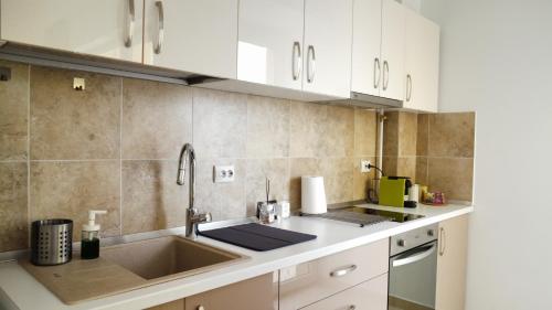 Η κουζίνα ή μικρή κουζίνα στο DUPLEX BELLE VIEW SINAIA-free parking