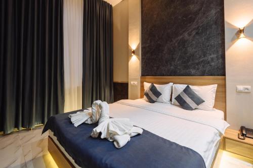 Katil atau katil-katil dalam bilik di Sofiya Tashkent Hotel