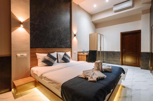 Katil atau katil-katil dalam bilik di Sofiya Tashkent Hotel