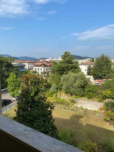 a view of a park from a balcony at Hotel Lanterna Padova in Abano Terme
