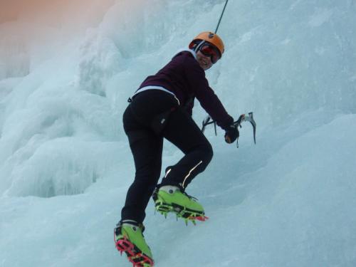 a person on skis jumping off of a snow bank at Haus Alpenblick in Ehrwald
