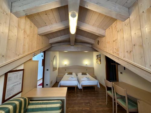 Postel nebo postele na pokoji v ubytování Hotel Garnì Maffei