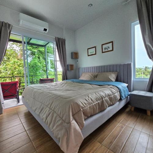 Postel nebo postele na pokoji v ubytování Trahad Villa Koh Samui
