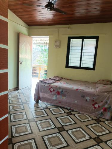ANTARA Holiday Homeにあるベッド