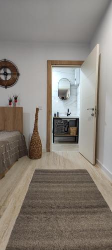 Katil atau katil-katil dalam bilik di Leaf apartment