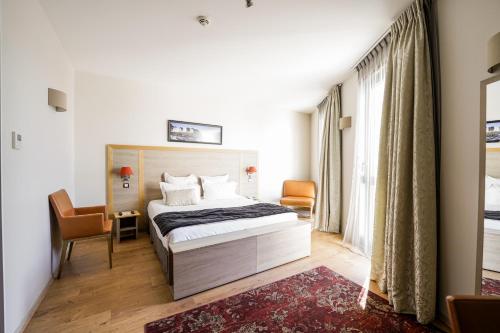 Hotel Vatel Bordeauxにあるベッド