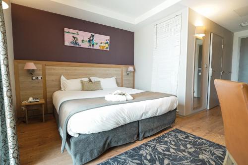 Hotel Vatel Bordeauxにあるベッド