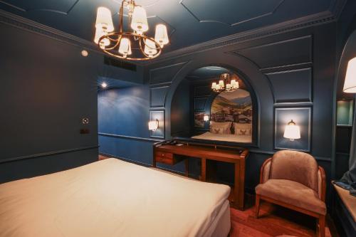 Ένα ή περισσότερα κρεβάτια σε δωμάτιο στο Otel1924