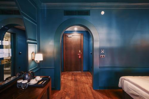 Ένα ή περισσότερα κρεβάτια σε δωμάτιο στο Otel1924