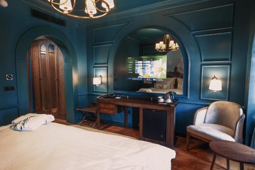 Ένα ή περισσότερα κρεβάτια σε δωμάτιο στο Otel1924