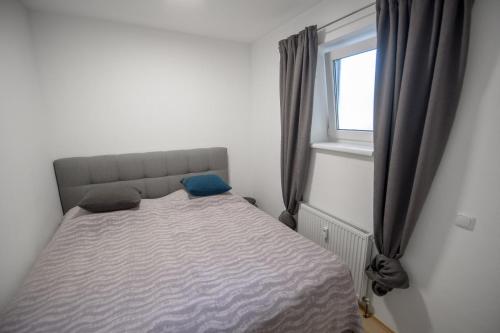 Postel nebo postele na pokoji v ubytování Ferienwohnung Nußbaumer