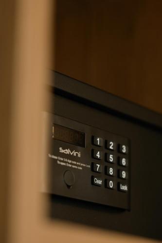 a close up of the control panel of a microwave oven at Cens Platinum Luxury Suites in Ioannina