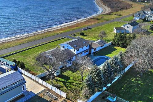 an aerial view of a house next to the ocean at Akasa in Stratford