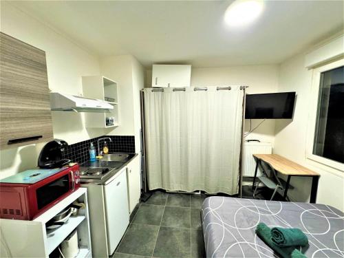 Kuchyň nebo kuchyňský kout v ubytování Studio Confortable Proche Gare