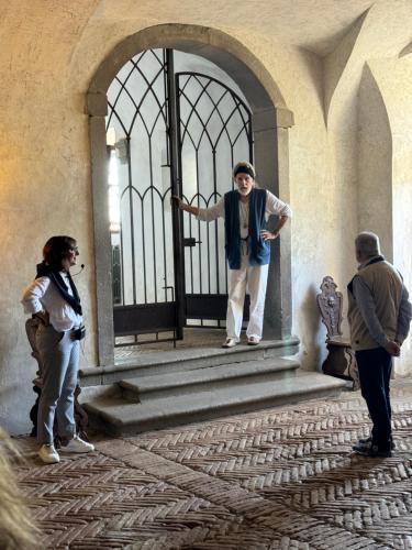 a group of people standing in front of a door at Agriturismo Buonasera in Bagnoregio