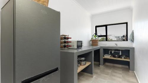 Oom Jan Guesthouseにあるキッチンまたは簡易キッチン