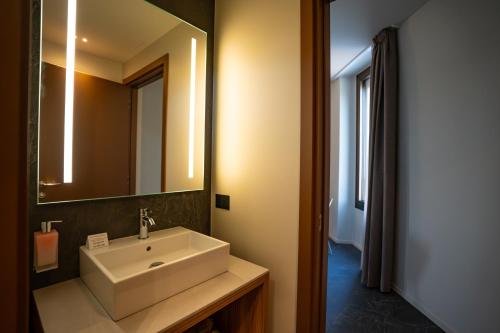 Koupelna v ubytování La Molgora Hotel