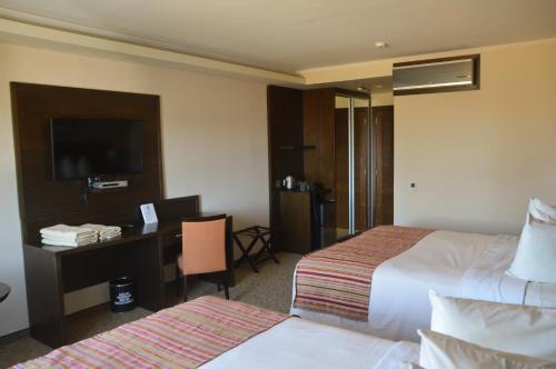 Postel nebo postele na pokoji v ubytování Mayim Hotel Termal & Spa